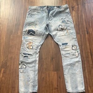 Stylish Light Blue Skinny Jeans with Butterfly Design